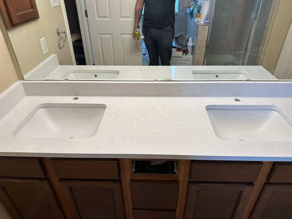 a bathroom with a double sink